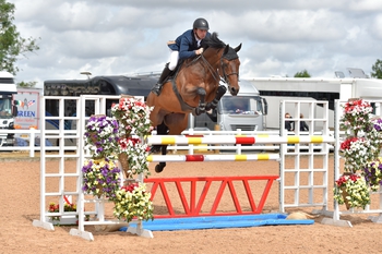 Christopher Smith claims victory in the Equitop Myoplast Senior Foxhunter Second Round at Arena UK 